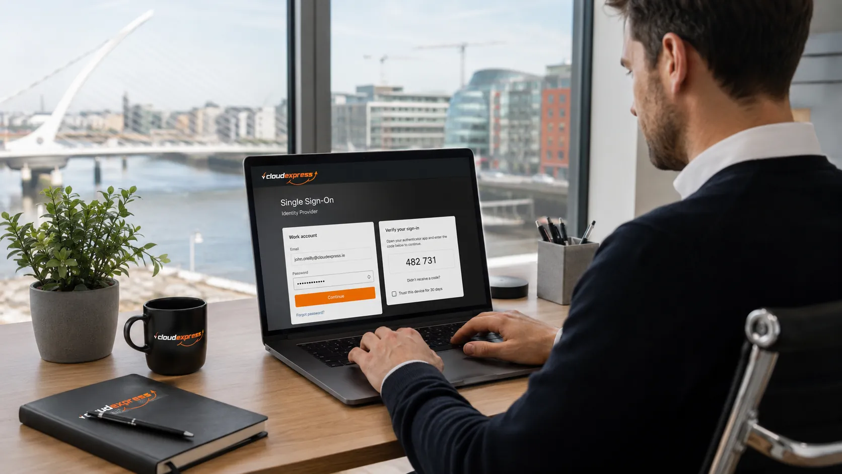 Person authenticating through identity provider login screen on laptop in professional office setting